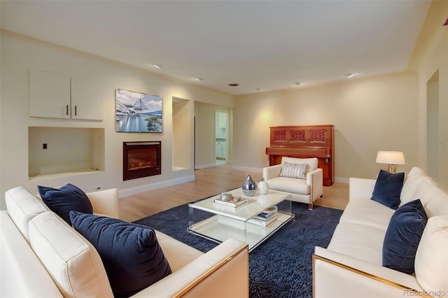 1275 Fairfax St, Denver, CO 80220 - living area with a fireplace and wood finished floors