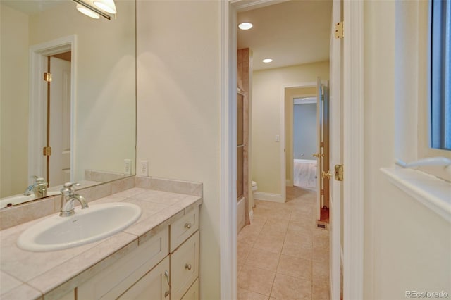 1275 Fairfax St, Denver, CO 80220 - full bathroom featuring vanity, tile patterned floors, recessed lighting, and combined bath / shower with glass door