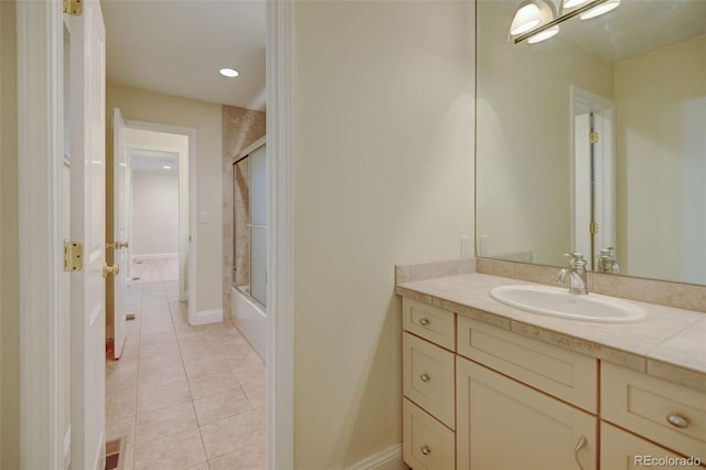 1275 Fairfax St, Denver, CO 80220 - bathroom with vanity, tile patterned floors, and bath / shower combo with glass door