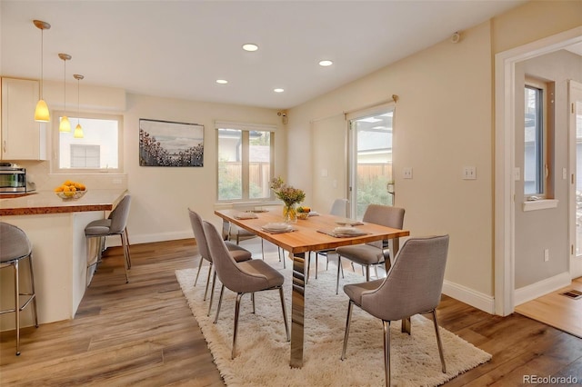 1275 Fairfax St, Denver, CO 80220 - dining area featuring light wood-type flooring and recessed lighting