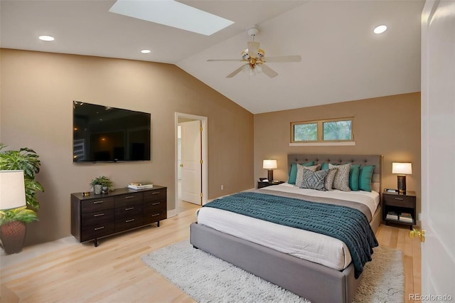 1275 Fairfax St, Denver, CO 80220 - bedroom featuring light wood-style floors, vaulted ceiling, a skylight, a ceiling fan, and recessed lighting