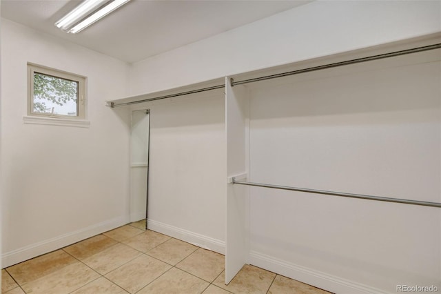 1275 Fairfax St, Denver, CO 80220 - spacious closet featuring light tile patterned flooring