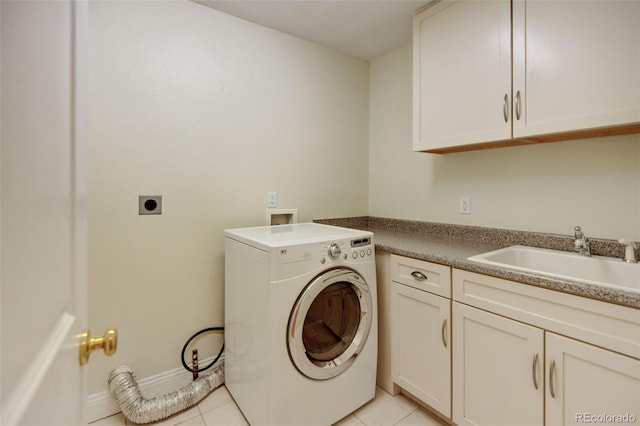 1275 Fairfax St, Denver, CO 80220 - washroom with washer / clothes dryer, cabinet space, and light tile patterned flooring