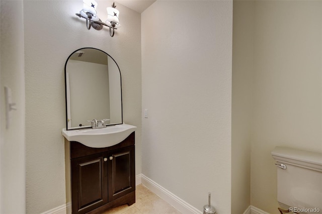 1275 Fairfax St, Denver, CO 80220 - half bathroom with vanity and tile patterned floors
