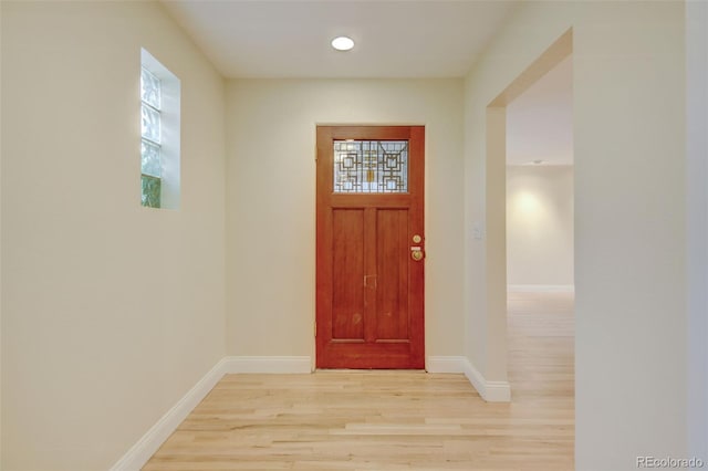 1275 Fairfax St, Denver, CO 80220 - entryway with light wood-style flooring and healthy amount of natural light