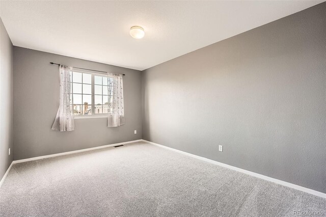 12362 Nate Cir, Parker, CO 80134 - carpeted spare room featuring baseboards