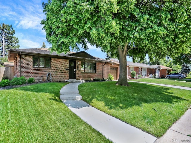 2046 S Quitman St, Denver, CO 80219 - single story home featuring an attached garage and brick siding