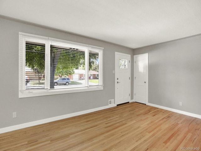 2046 S Quitman St, Denver, CO 80219 - entrance foyer with baseboards and wood finished floors
