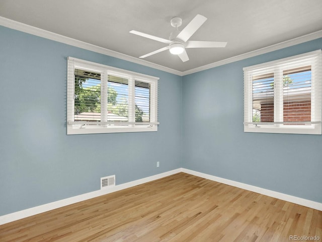 2046 S Quitman St, Denver, CO 80219 - unfurnished room featuring crown molding, wood finished floors, and ceiling fan