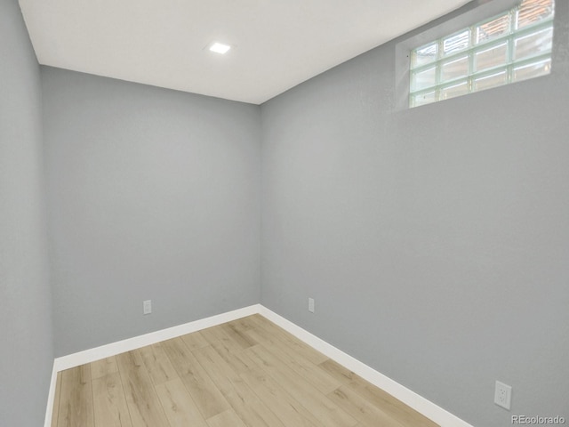2046 S Quitman St, Denver, CO 80219 - spare room featuring wood finished floors and baseboards