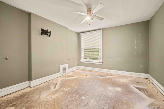 709 27th St, Denver, CO 80205 - spare room with baseboards, a ceiling fan, and hardwood / wood-style floors