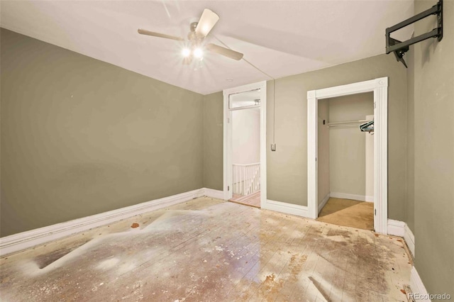 709 27th St, Denver, CO 80205 - unfurnished bedroom featuring baseboards, a ceiling fan, and wood-type flooring