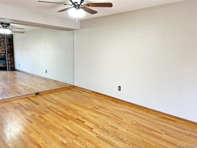 611 E 7th Ave, Denver, CO 80203 - unfurnished room featuring baseboards, a ceiling fan, and wood finished floors
