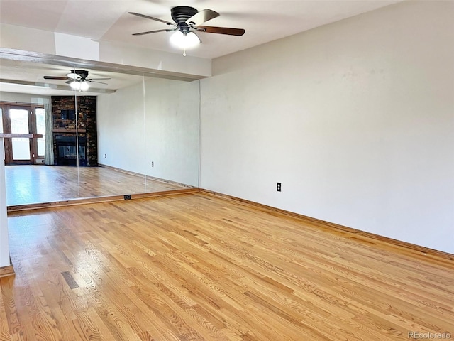 611 E 7th Ave, Denver, CO 80203 - empty room with a ceiling fan, baseboards, and wood finished floors