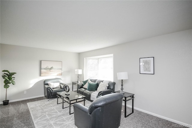 living room featuring baseboards and light carpet