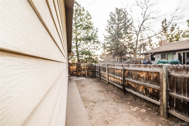 view of home's exterior featuring fence