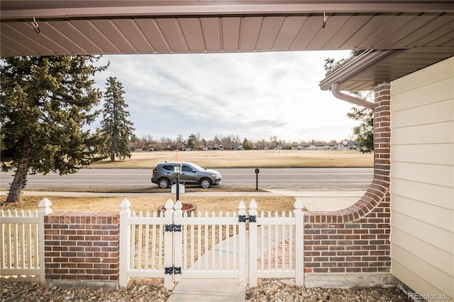 view of yard featuring a gate and fence