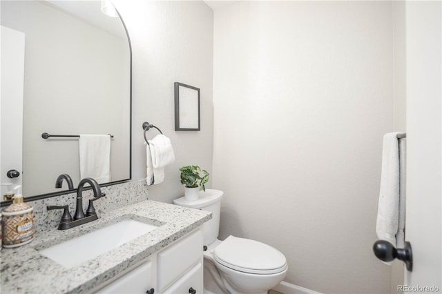 1409 S Moline St, Aurora, CO 80012 - bathroom featuring vanity and toilet