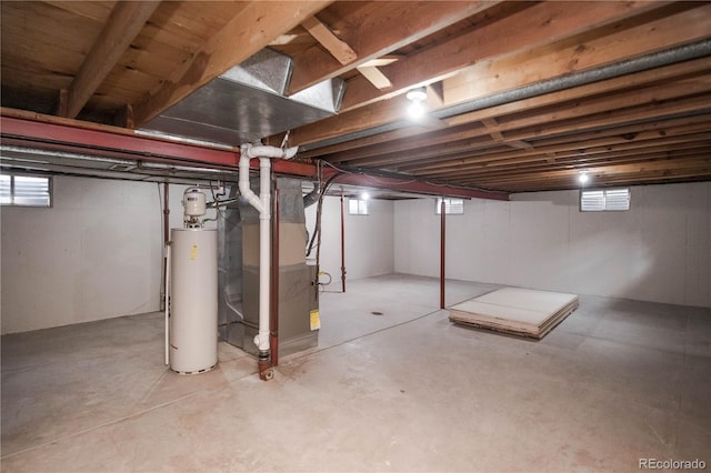 1409 S Moline St, Aurora, CO 80012 - basement featuring water heater and heating unit