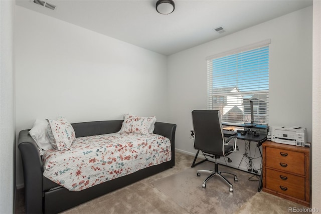 bedroom with carpet, visible vents, and baseboards