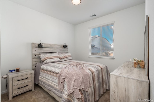 bedroom with carpet and visible vents