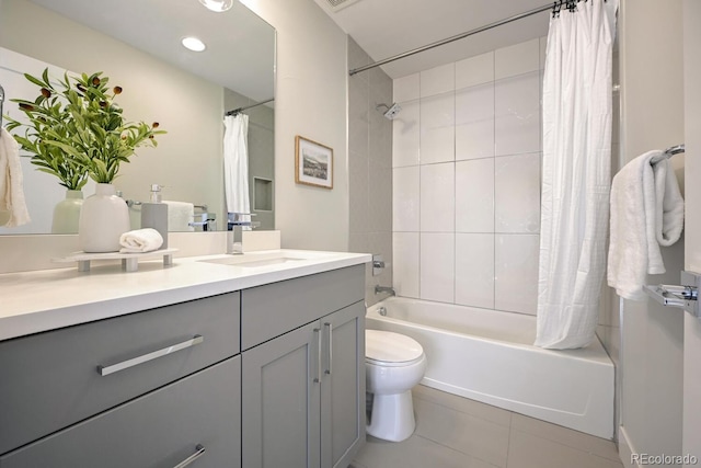 full bathroom with shower / bathtub combination with curtain, vanity, tile patterned flooring, and toilet