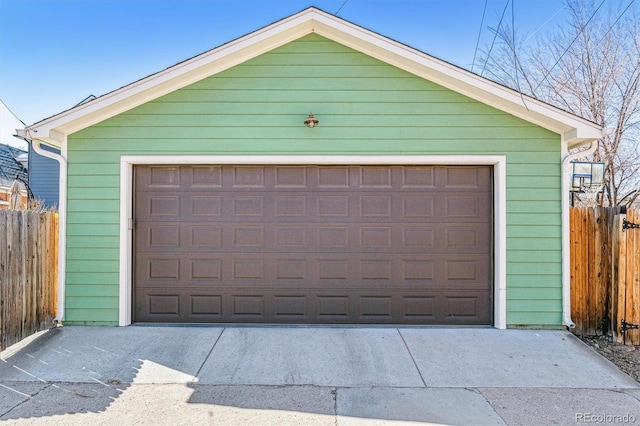 detached garage with fence