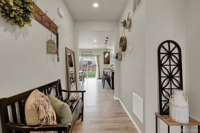 hallway featuring light hardwood / wood-style floors