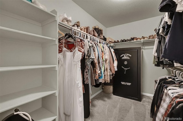 spacious closet with carpet flooring