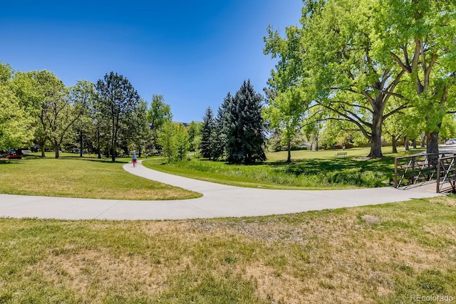 view of home's community featuring a lawn