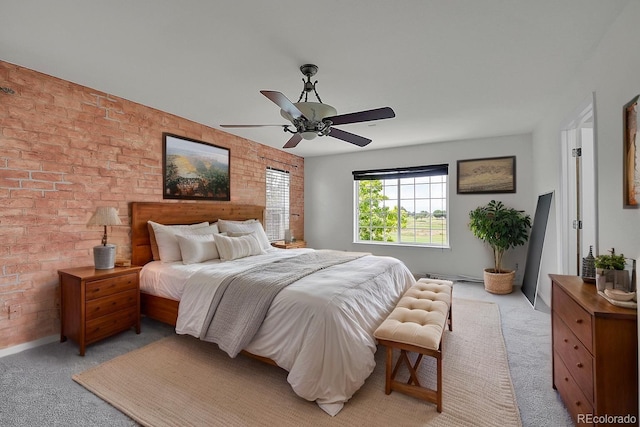 5131 Netherland St, Denver, CO 80249 - bedroom with light carpet, brick wall, and ceiling fan