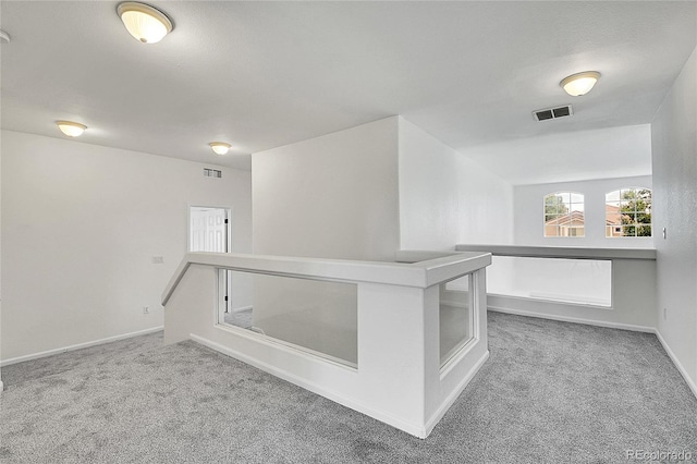 5131 Netherland St, Denver, CO 80249 - hall with carpet floors and an upstairs landing