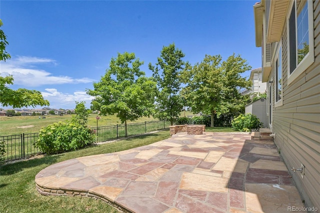 5131 Netherland St, Denver, CO 80249 - fenced backyard with a patio