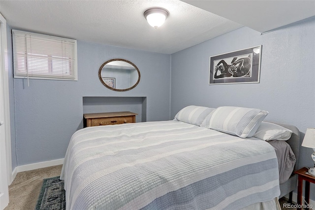 1434 Osceola St, Denver, CO 80204 - bedroom featuring carpet floors, baseboards, a textured ceiling, and a textured wall