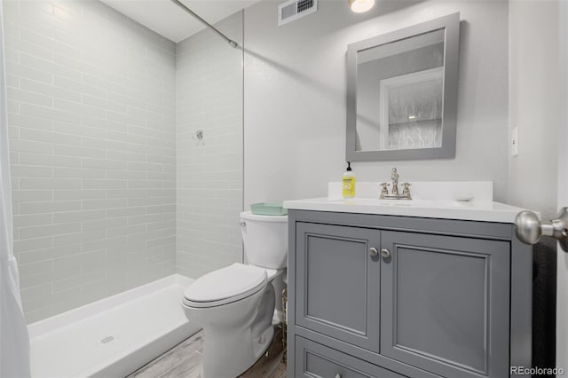 527 English Sparrow Trl, Highlands Ranch, CO 80129 - full bath featuring toilet, vanity, and tiled shower