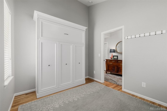 527 English Sparrow Trl, Highlands Ranch, CO 80129 - unfurnished bedroom with light wood finished floors and baseboards