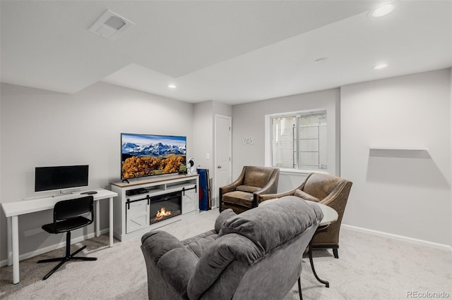 527 English Sparrow Trl, Highlands Ranch, CO 80129 - living room featuring light colored carpet, recessed lighting, baseboards, a glass covered fireplace, and a desk