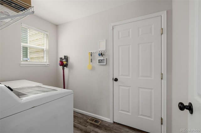 527 English Sparrow Trl, Highlands Ranch, CO 80129 - laundry room with dark wood-type flooring, baseboards, and washing machine and dryer
