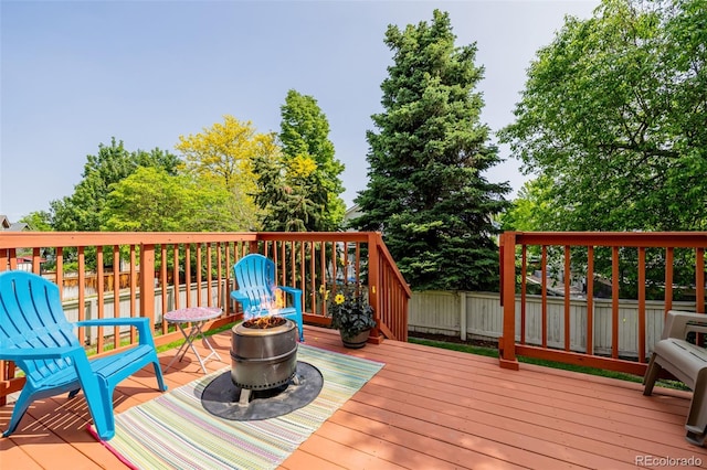 527 English Sparrow Trl, Highlands Ranch, CO 80129 - deck featuring an outdoor fire pit