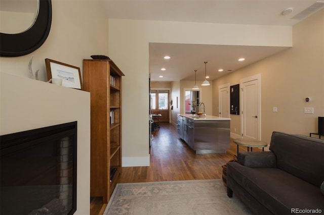 1008 River Park Rd, Buena Vista, CO 81211 - living area with dark wood finished floors, recessed lighting, and baseboards