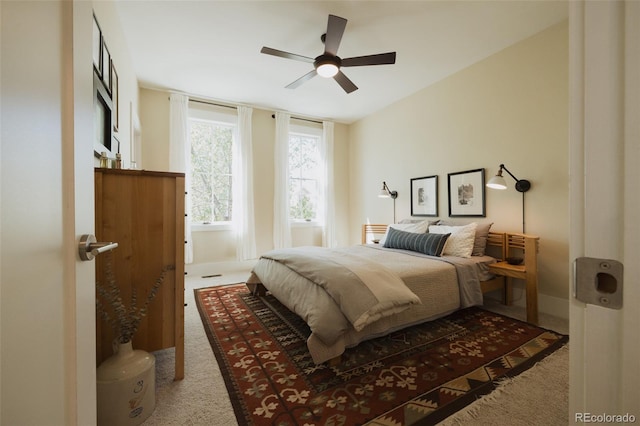 1008 River Park Rd, Buena Vista, CO 81211 - bedroom with light carpet, a ceiling fan, and baseboards
