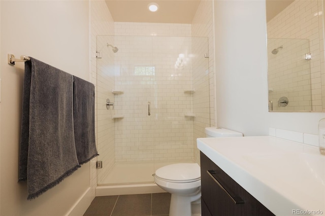 1008 River Park Rd, Buena Vista, CO 81211 - full bathroom featuring tile patterned flooring, toilet, a shower stall, and vanity