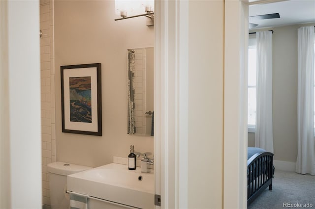 1008 River Park Rd, Buena Vista, CO 81211 - bathroom with toilet, vanity, and plenty of natural light