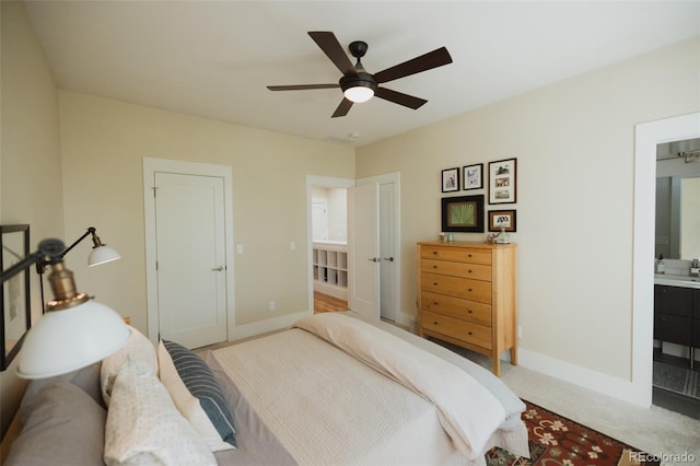 1008 River Park Rd, Buena Vista, CO 81211 - bedroom featuring baseboards, connected bathroom, and ceiling fan