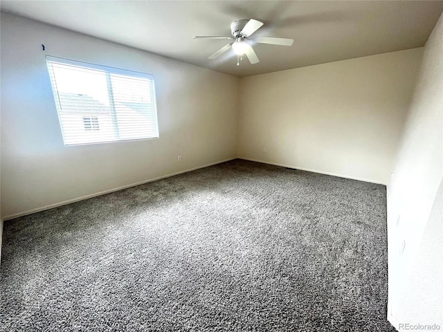 spare room with ceiling fan