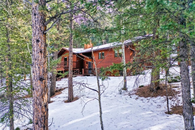 view of yard covered in snow