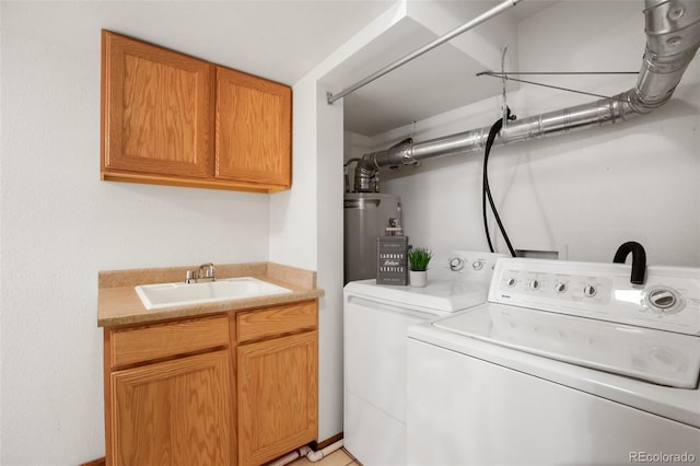 washroom with separate washer and dryer, sink, gas water heater, and cabinets