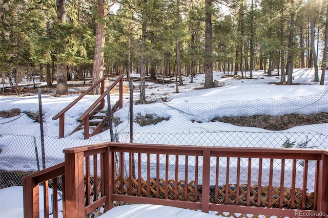 view of snow covered deck