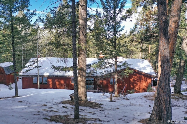 view of snow covered property