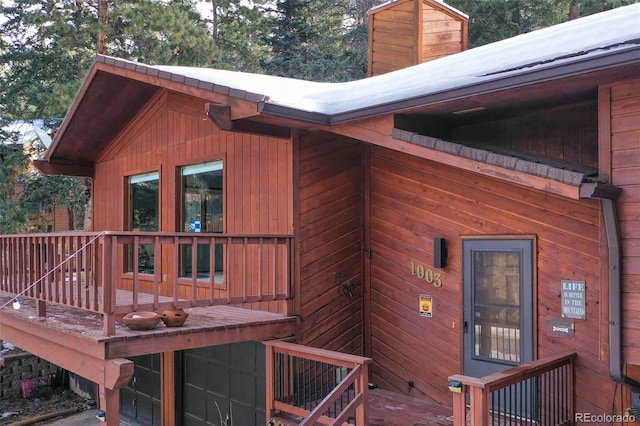 1003 Kings Crown Rd, Woodland Park, CO 80863 - exterior space featuring a chimney and a deck